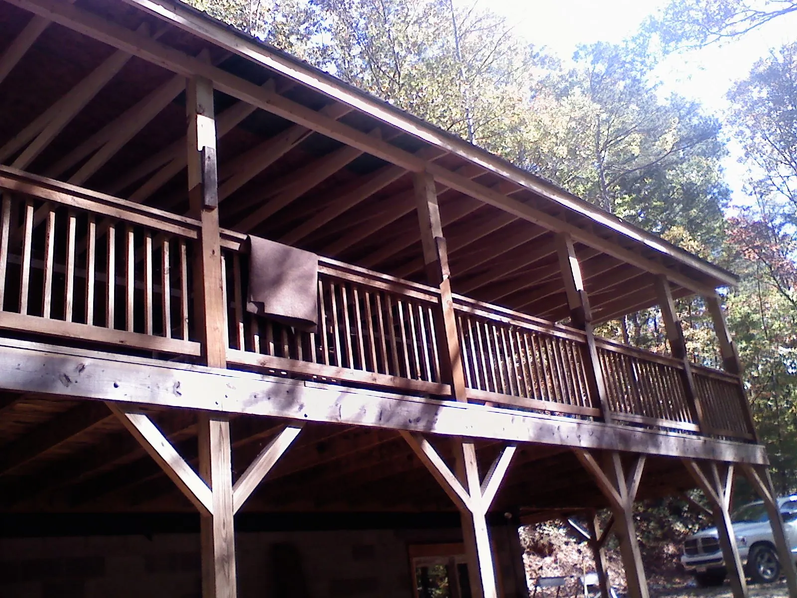 Timber framing under a new elevated porch and deck — Roof Leak Repair in Martinsburg by Roofing Brothers